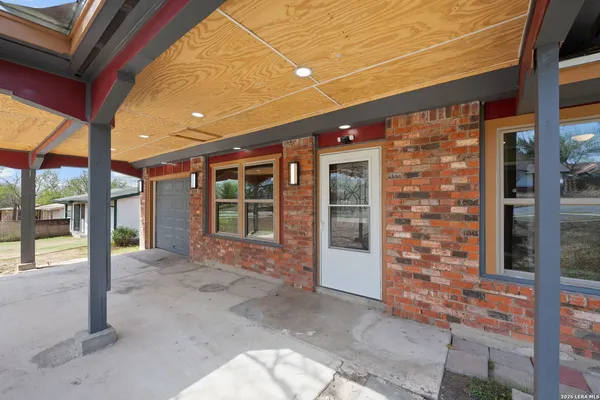 a view of entrance with an outdoor space