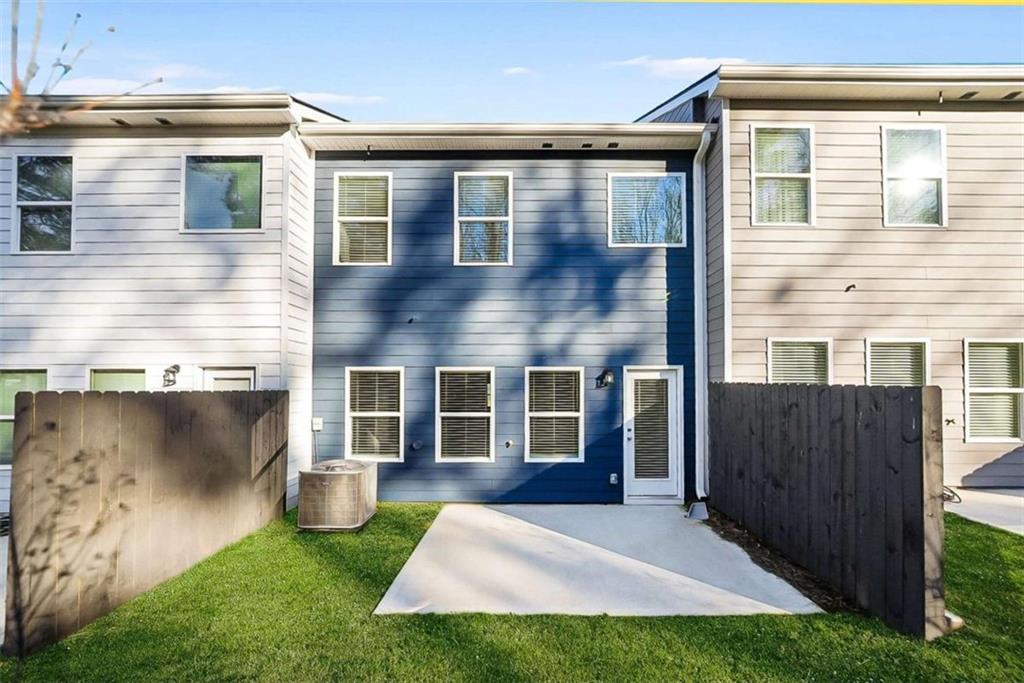 1328 Riverstone Road Jonesboro, GA 30238 - Photo 21 of 26 a front view of house with yard
