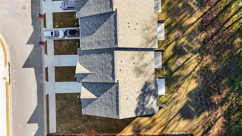 1328 Riverstone Road Jonesboro, GA 30238 - Photo 22 of 26 an aerial view of residential houses with outdoor space