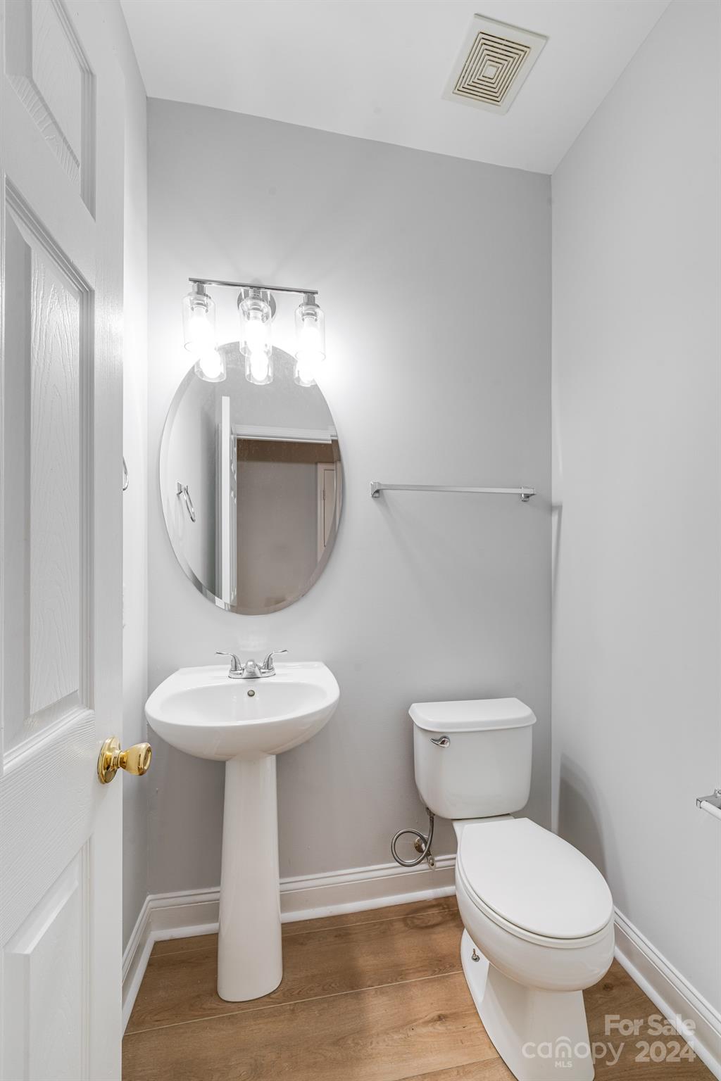 4420 Red Hook Road Monroe, NC 28110 - Photo 16 of 34 a bathroom with a toilet sink and mirror