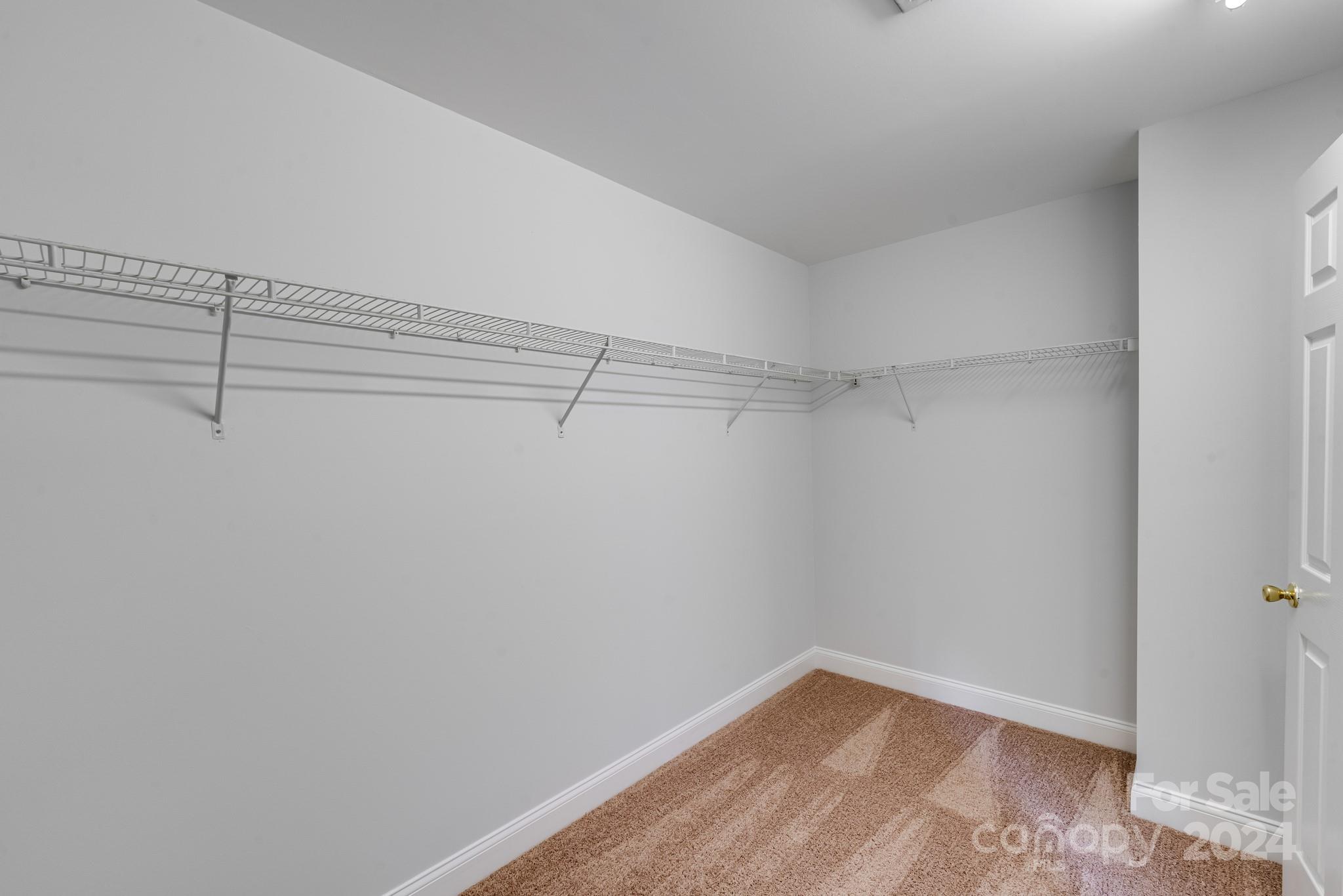 4420 Red Hook Road Monroe, NC 28110 - Photo 18 of 34 a view of a room with racks on the wall