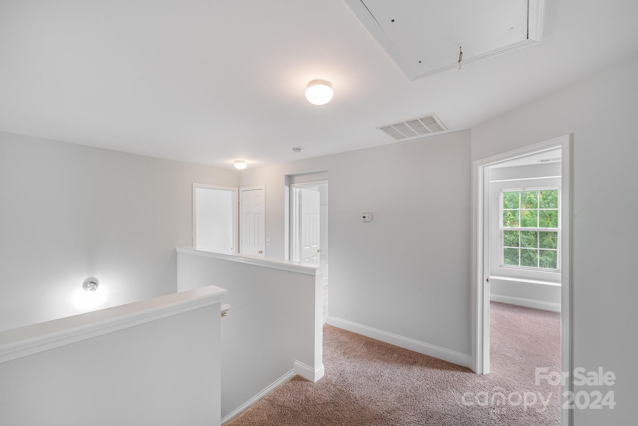 4420 Red Hook Road Monroe, NC 28110 - Photo 22 of 34 wooden floor in an empty room with a window