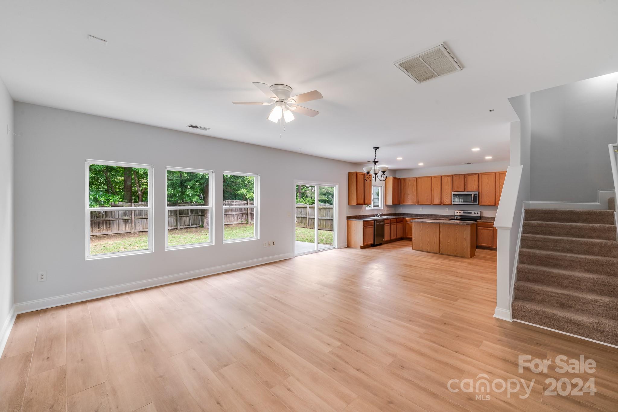 4420 Red Hook Road Monroe, NC 28110 - Photo 8 of 34 a view of an empty room with wooden floor and a window