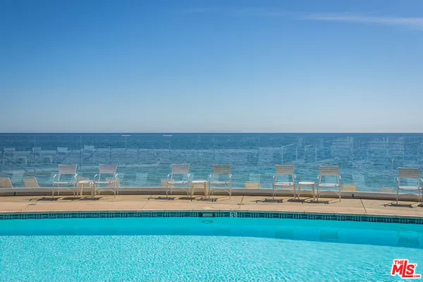 a view of a living room with a swimming pool