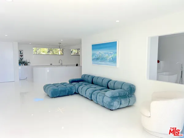 a living room with furniture and a couch