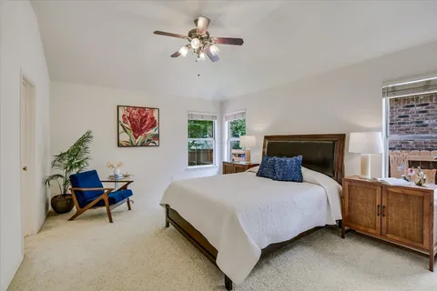 a bedroom with a bed furniture and a window