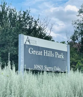 a view of a deck with a small yard