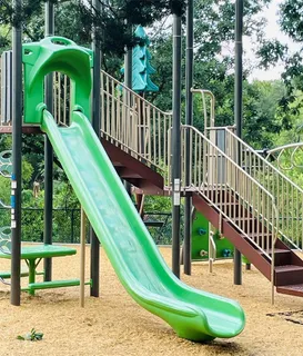 an aerial view of a houses with yard