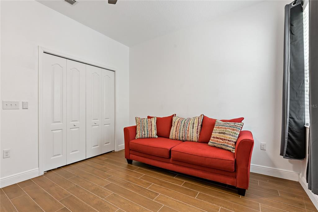 178 Magneta Loop Auburndale, FL 33823 - Photo 27 of 77 a living room with furniture and a rug