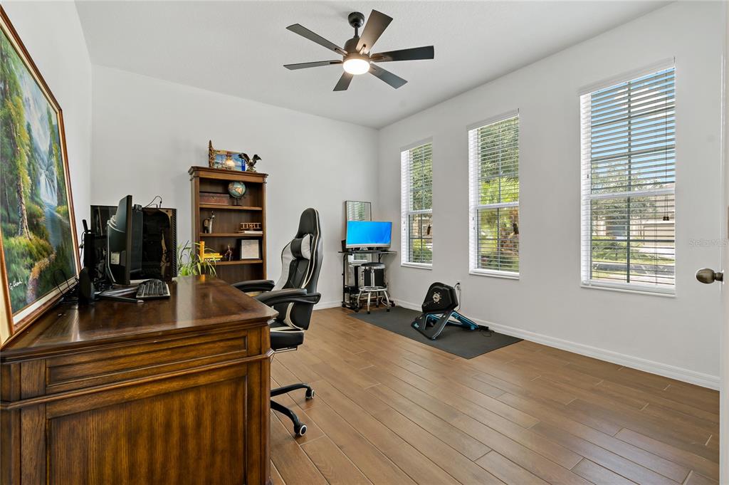 178 Magneta Loop Auburndale, FL 33823 - Photo 36 of 77 a view of a workspace with furniture and a window