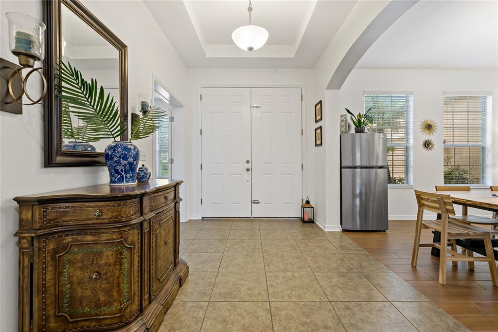 178 Magneta Loop Auburndale, FL 33823 - Photo 4 of 77 a kitchen with stainless steel appliances a refrigerator and a stove top oven