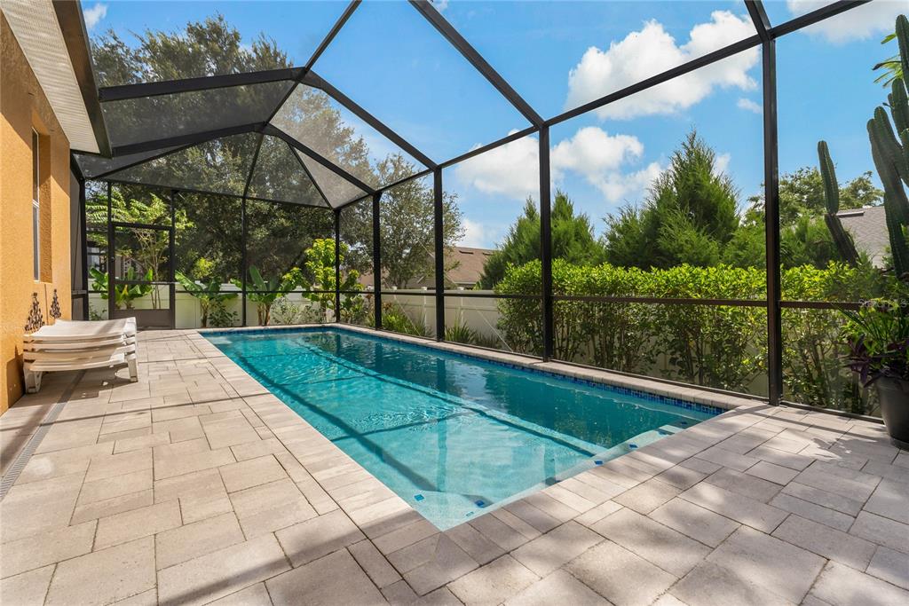178 Magneta Loop Auburndale, FL 33823 - Photo 41 of 77 a view of backyard with a swimming pool and sitting area