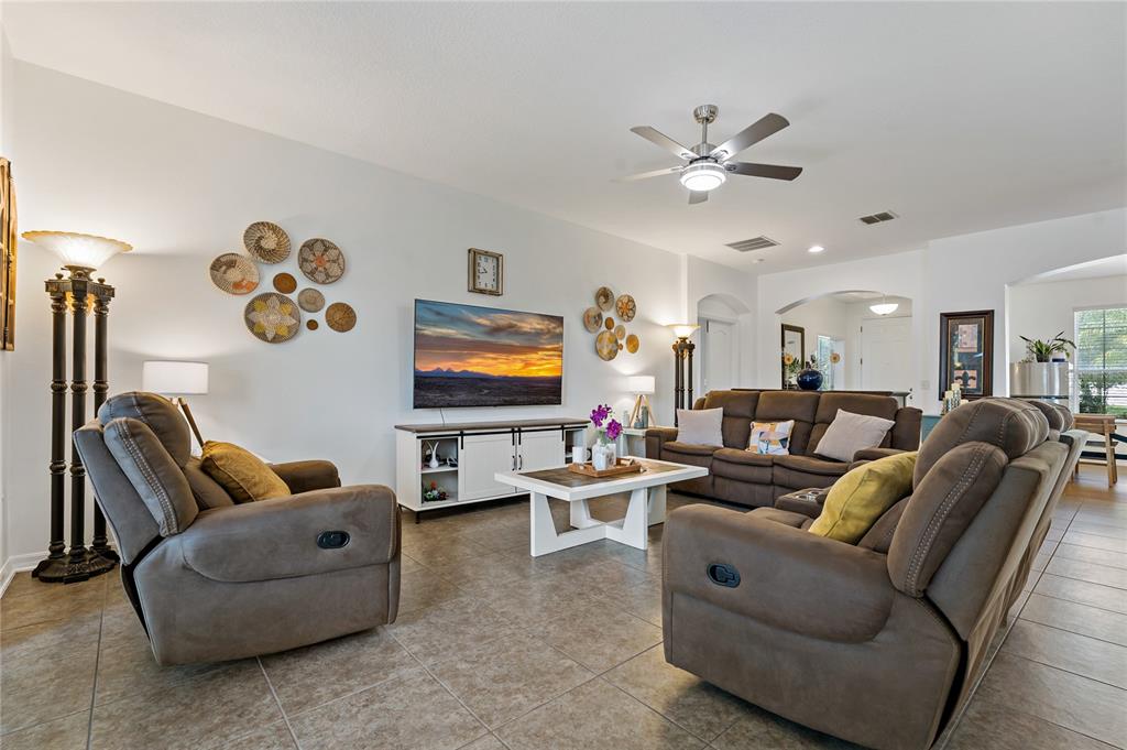 178 Magneta Loop Auburndale, FL 33823 - Photo 5 of 77 a living room with furniture and ceiling fan