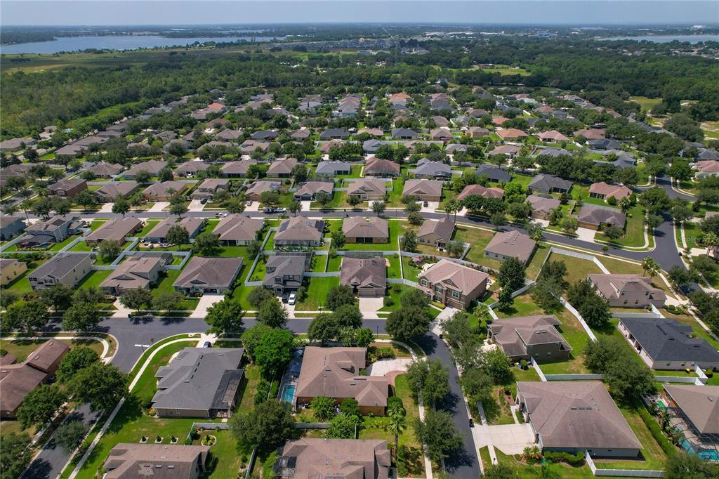 178 Magneta Loop Auburndale, FL 33823 - Photo 57 of 77 an aerial view of a city with lots of residential buildings
