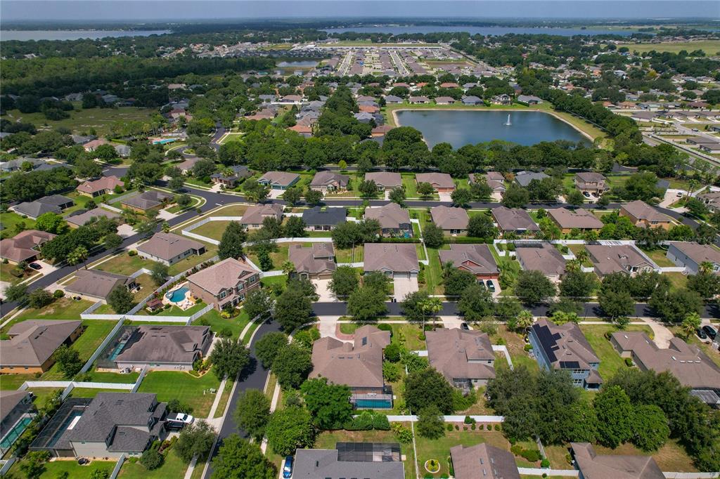 178 Magneta Loop Auburndale, FL 33823 - Photo 58 of 77 an aerial view of residential houses with outdoor space