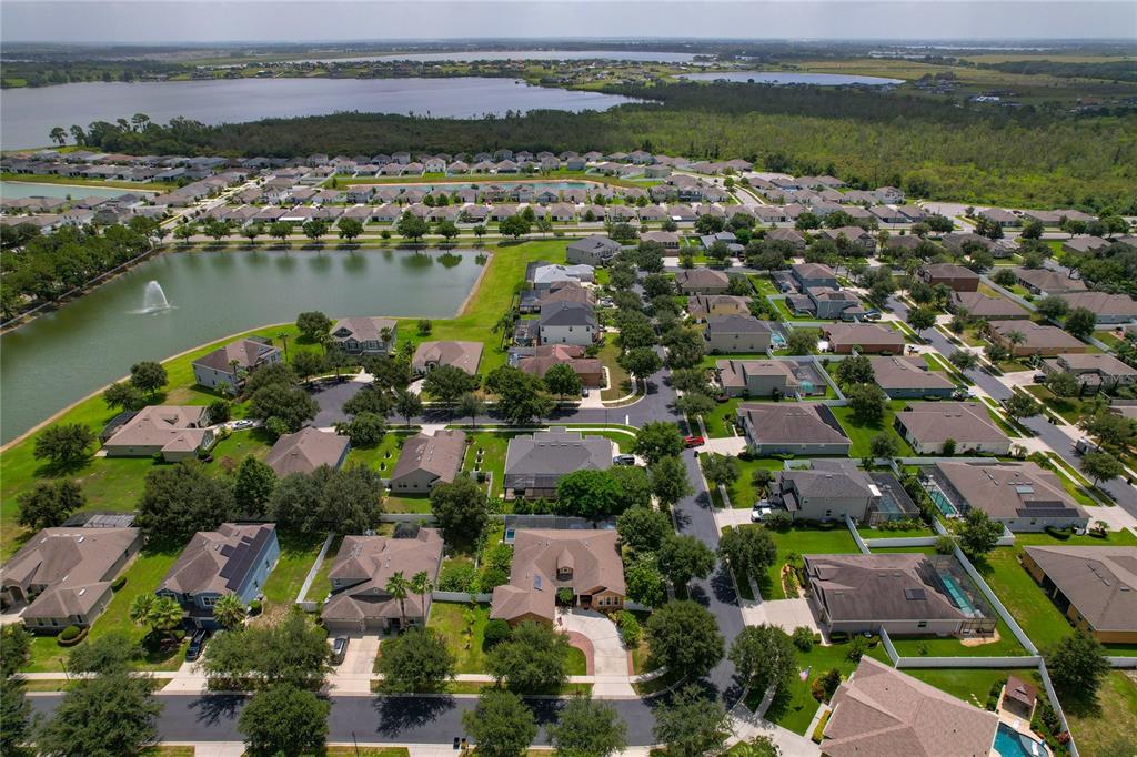 178 Magneta Loop Auburndale, FL 33823 - Photo 59 of 77 an aerial view of ocean and residential houses with outdoor space