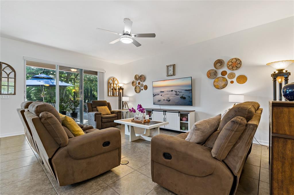 178 Magneta Loop Auburndale, FL 33823 - Photo 6 of 77 a living room with furniture and a large window