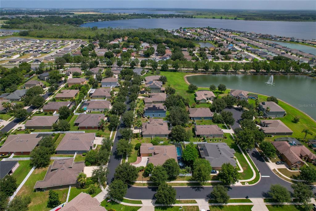178 Magneta Loop Auburndale, FL 33823 - Photo 61 of 77 an aerial view of residential houses with outdoor space and river