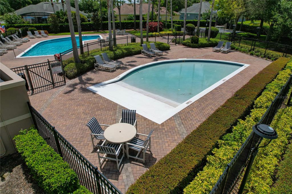 178 Magneta Loop Auburndale, FL 33823 - Photo 68 of 77 a view of a swimming pool with a patio and a yard