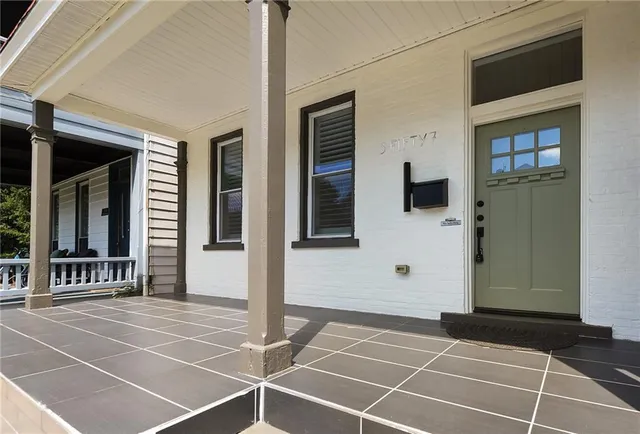 a view of a entryway door front of house