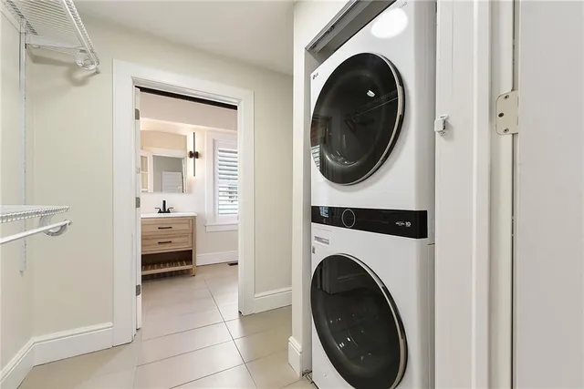 a view of a hallway with washer and dryer