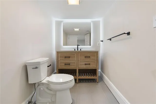 a view of a house with a yard and plants