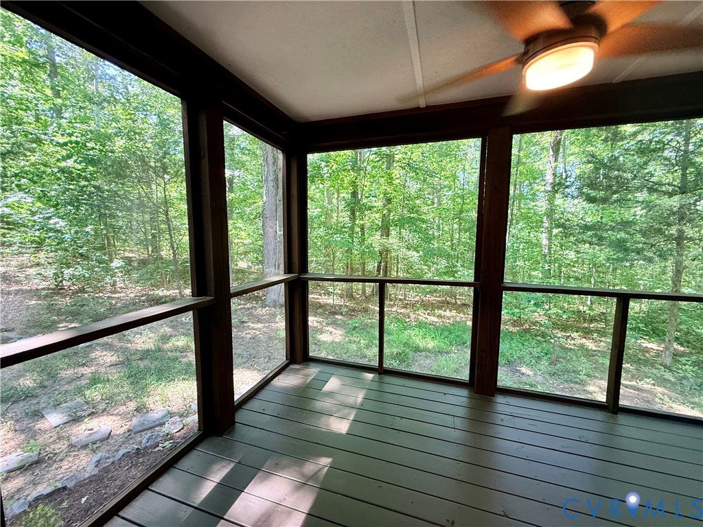 2590 Davis Mill Road Goochland, VA 23063 - Photo 22 of 33 a view of a large deck with wooden floor