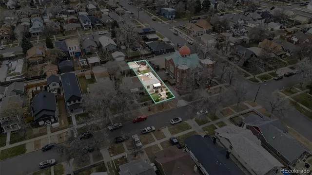 an aerial view of house with outdoor space