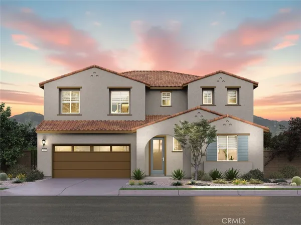 a front view of a house with yard
