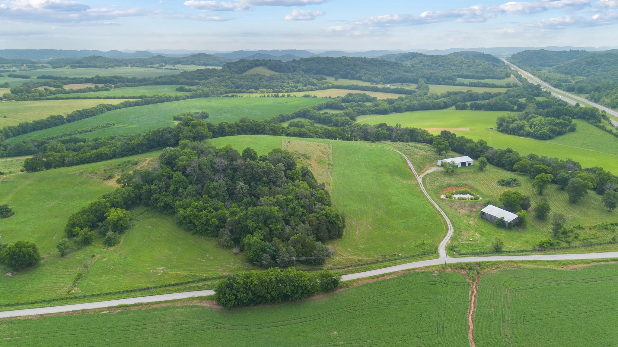 1914 Thompson's Station Road West Thompson's Station, TN 37179 - Photo 21 of 21 an aerial view of a golf course with a lake view