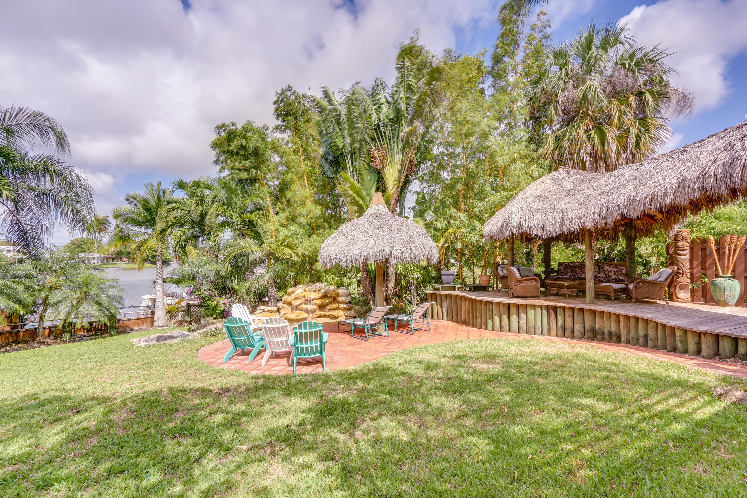 1811 High Ridge Road Lake Worth, FL 33461 - Photo 1 of 39 Back Yard/lake