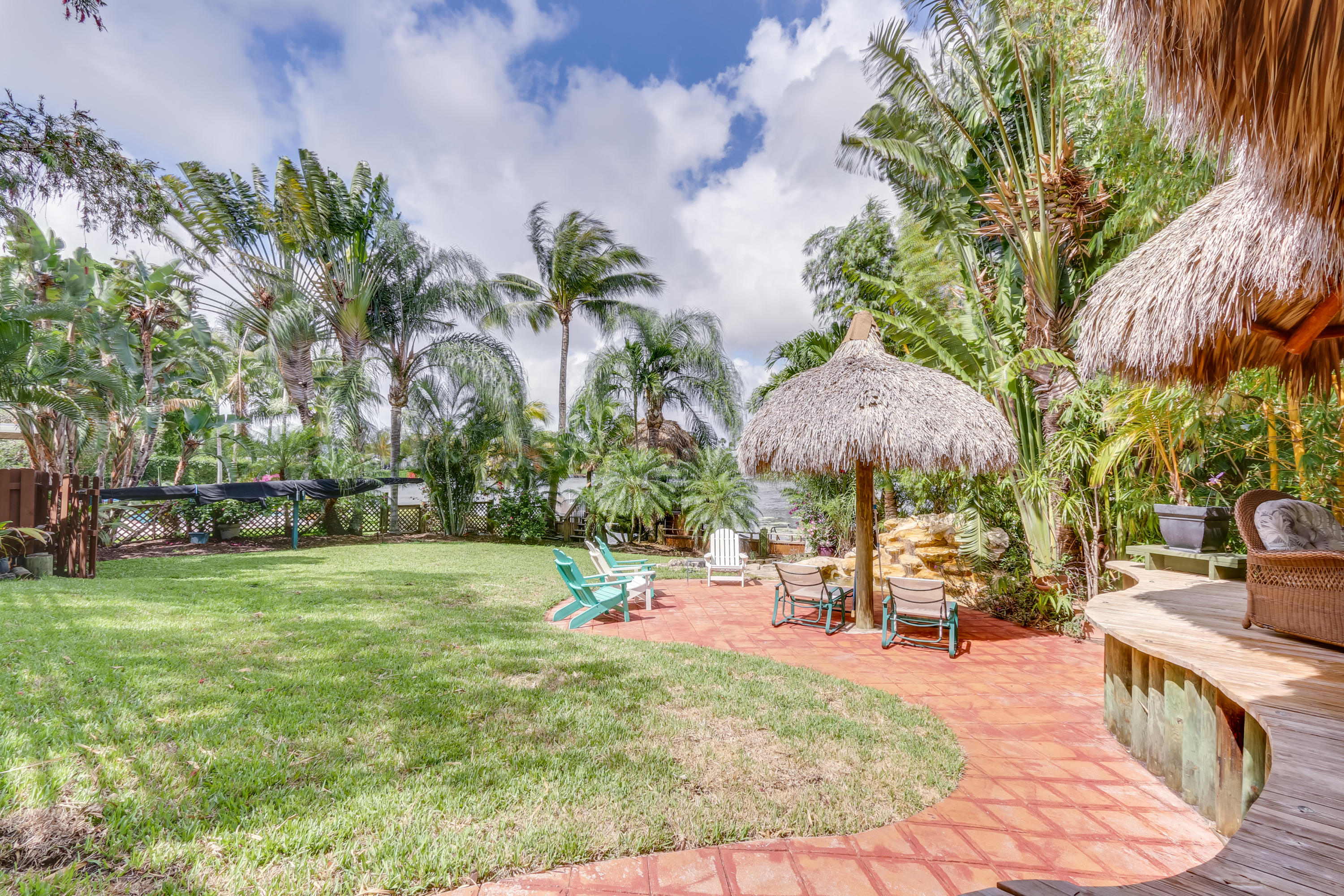 1811 High Ridge Road Lake Worth, FL 33461 - Photo 2 of 39 Back Yard/Lake
