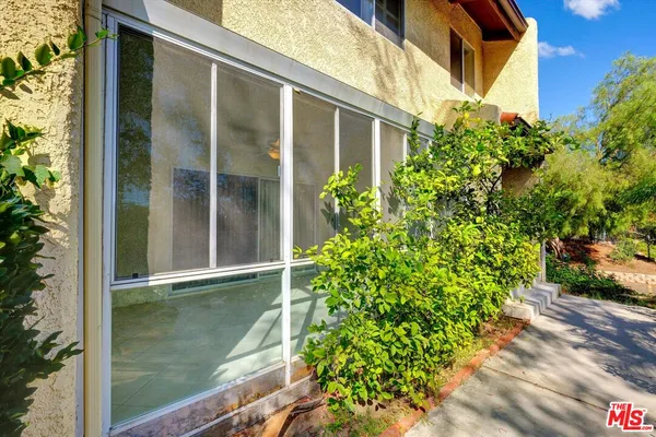 a view of a window of an outdoor space