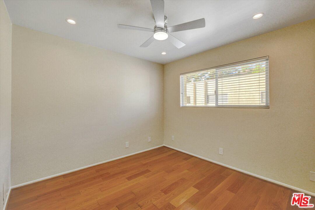 9634 Vía Rimini, Unit 118 Burbank, CA 91504 - Photo 20 of 35 an empty room with a window