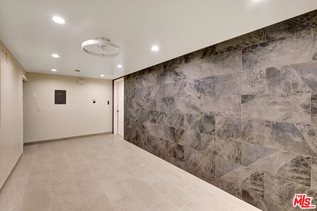 9634 Vía Rimini, Unit 118 Burbank, CA 91504 - Photo 28 of 35 a view of livingroom with wooden floor