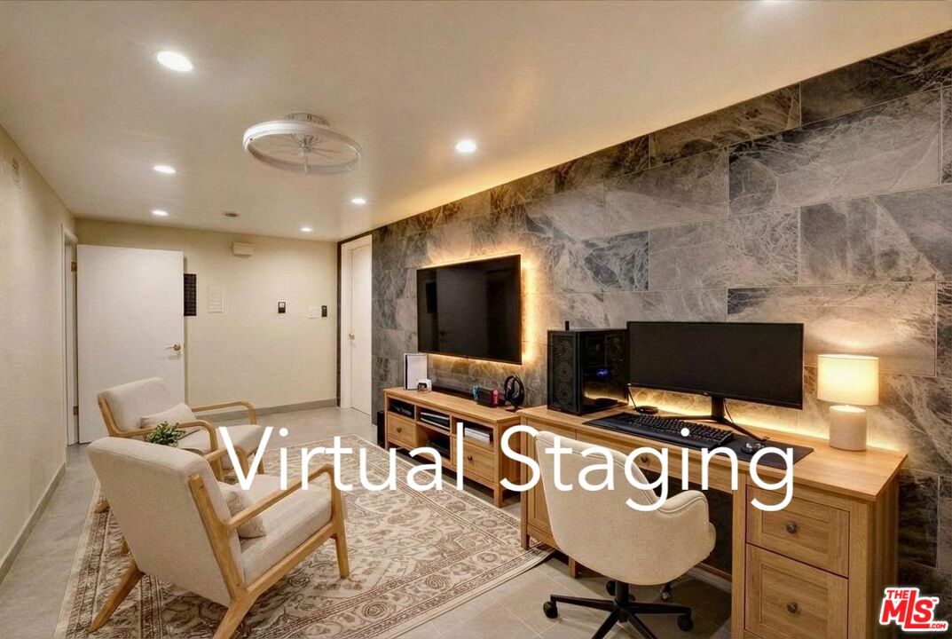 9634 Vía Rimini, Unit 118 Burbank, CA 91504 - Photo 29 of 35 a living room with furniture and a flat screen tv