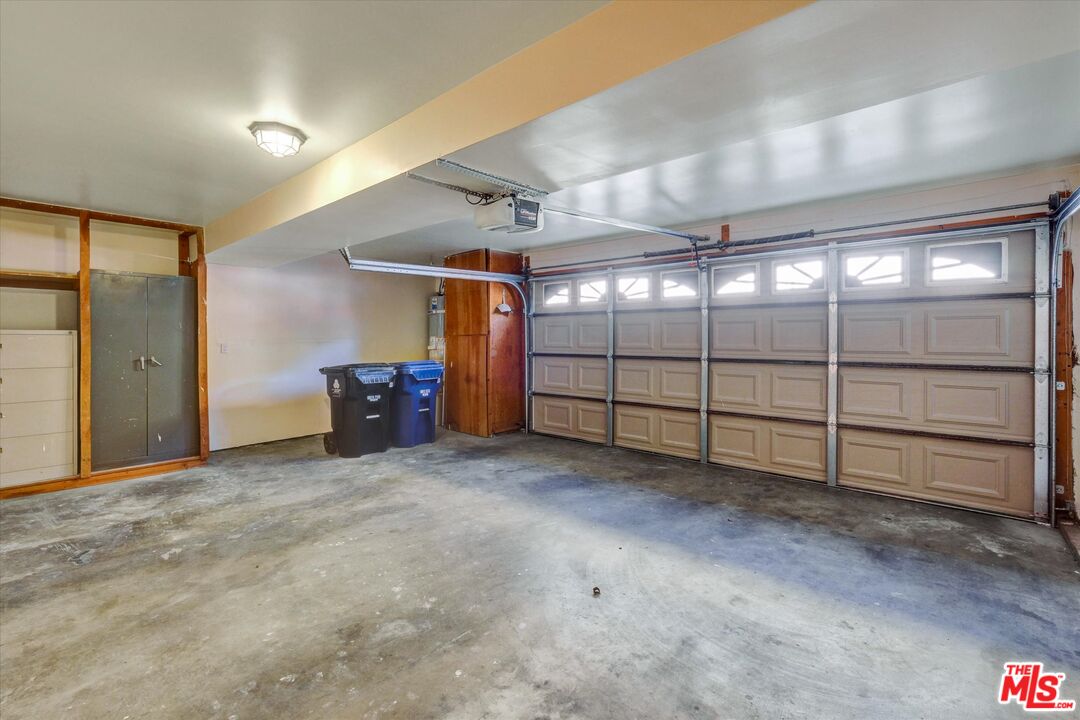 9634 Via Rimini, Unit 118 Sun Valley, CA 91504 - Photo 33 of 33 a view of a garage