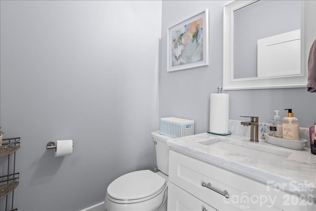 24 Mink Farm Road Leicester, NC 28748 - Photo 16 of 35 a bathroom with a toilet and a sink