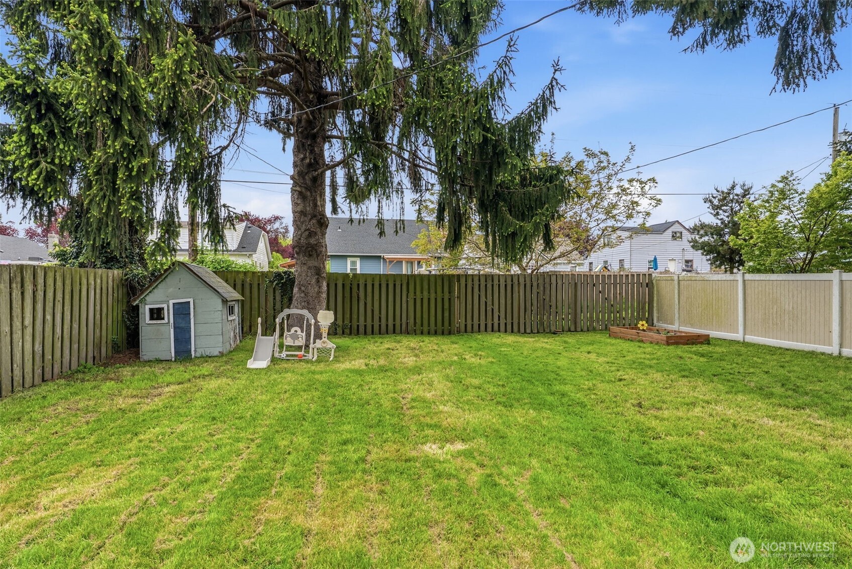2828 Fir Street Longview, WA 98632 - Photo 16 of 18 a house view with a garden space