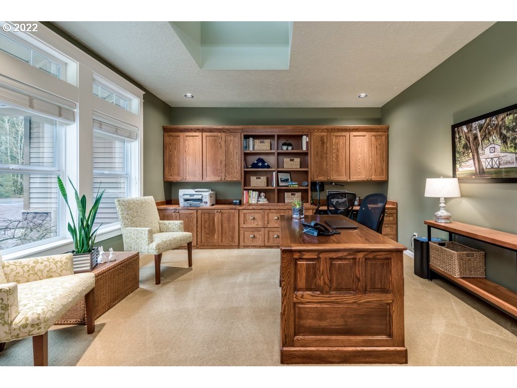 13831 South Carus Road Oregon City, OR 97045 - Photo 3 of 32 a living room with furniture and a flat screen tv