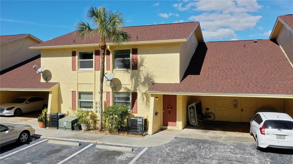 7535 Abonado Road Tampa, FL 33615 - Photo 1 of 1 a front view of a house with parking space