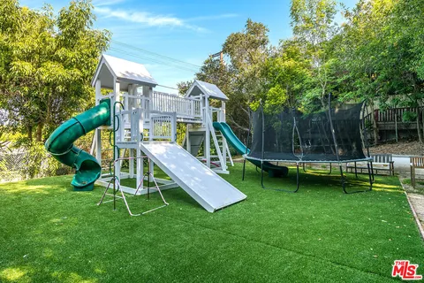 $6,495,000 | 18762 Wells Drive, Tarzana, CA 91356