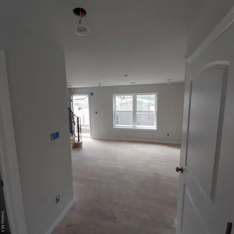 a view of a livingroom with a window
