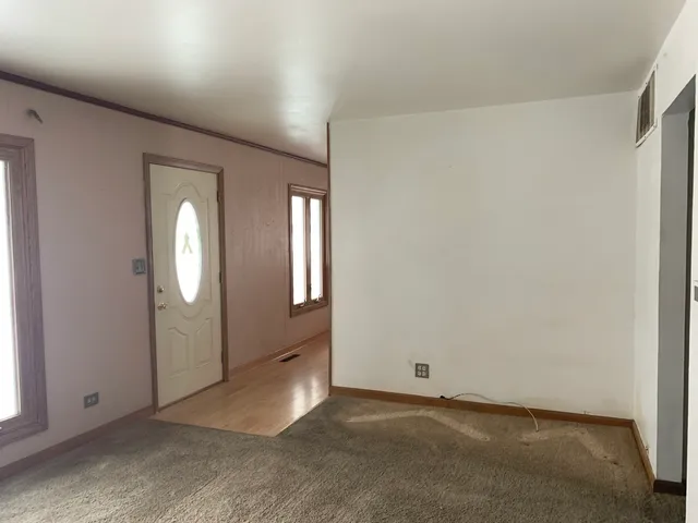 an empty room with windows