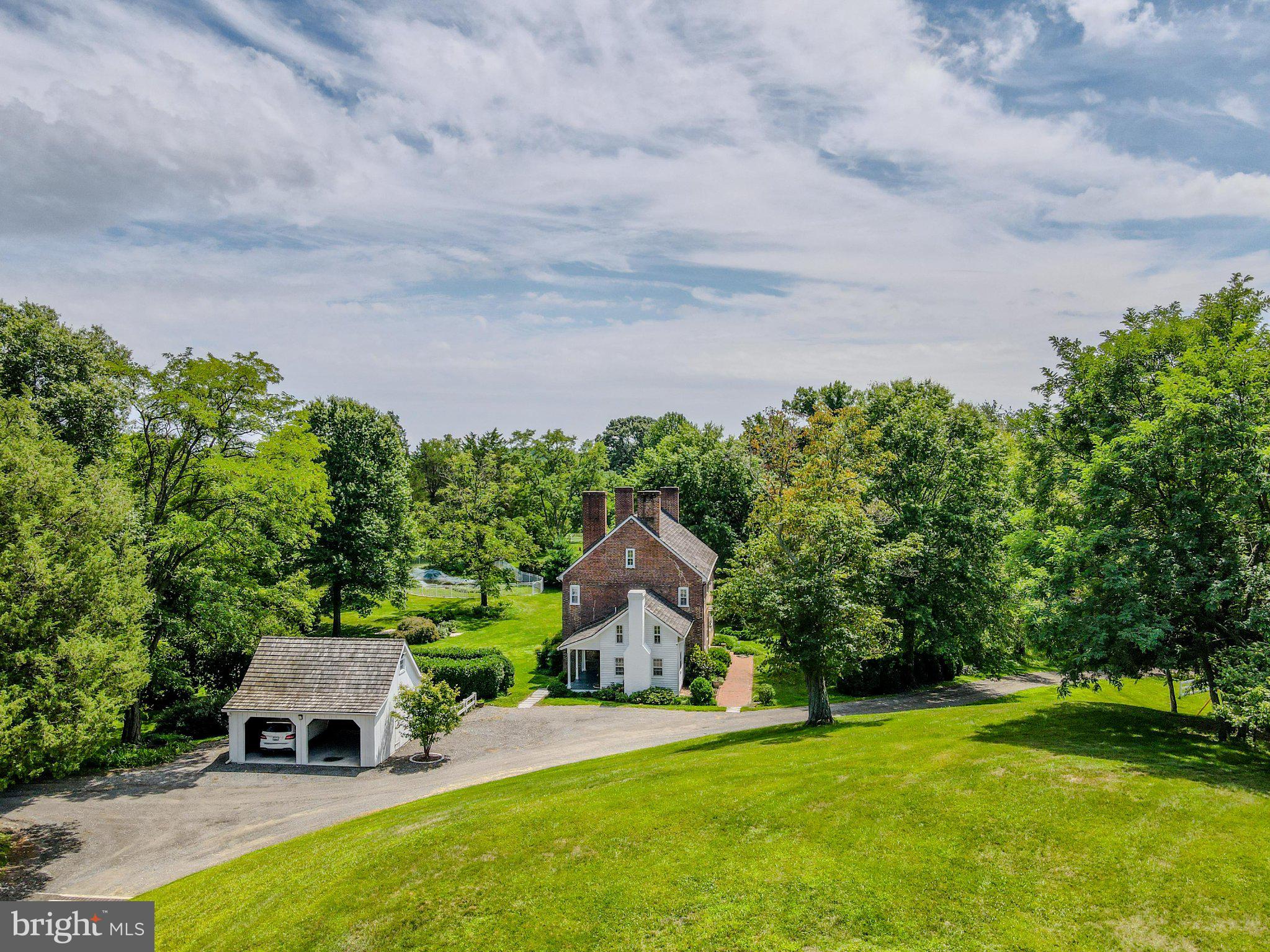 Charming home nestled in lush greenery.