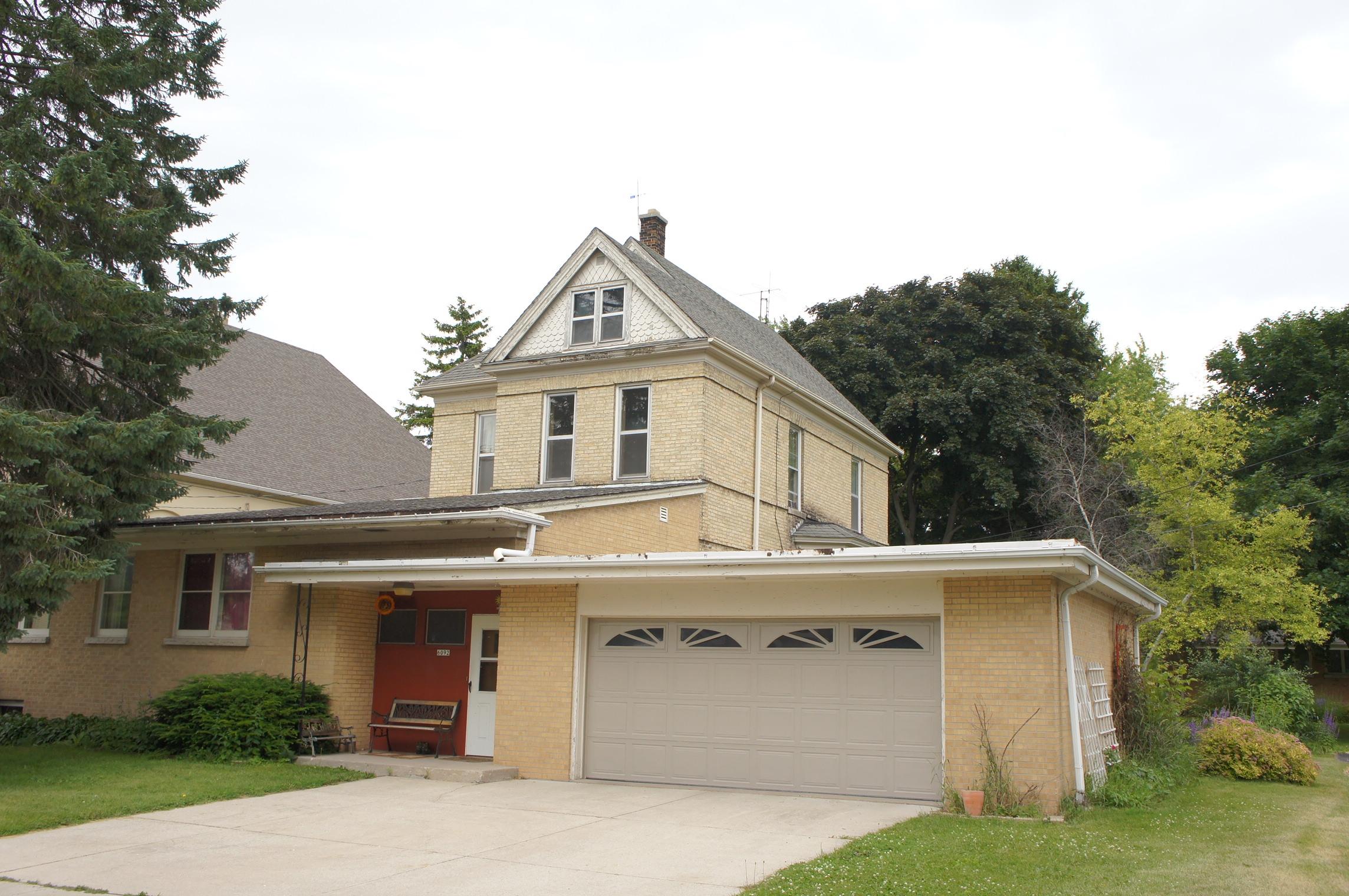 6092 Lake Church Road Belgium, WI 53004 - Photo 1 of 1 Front Exterior with 2 1/2 Car Garage