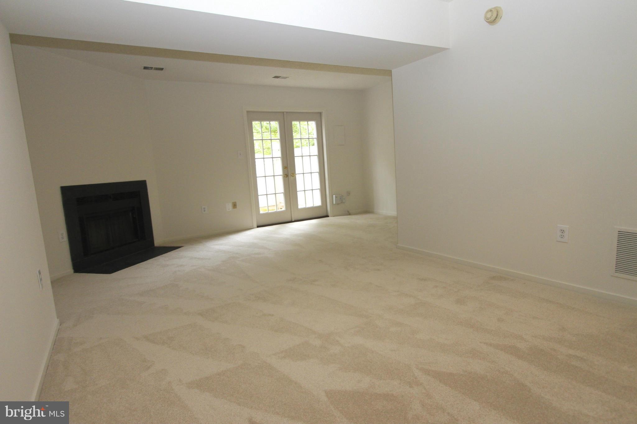 2318 Hunters Square Court Reston, VA 20191 - Photo 21 of 28 Rec Room w/Fireplace
