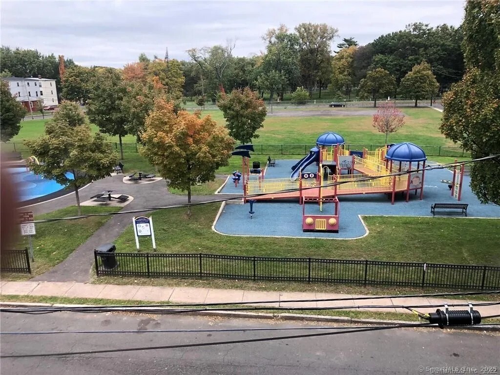63 Seyms Street Hartford, CT 06120 - Photo 2 of 12 an aerial view of a house with a yard