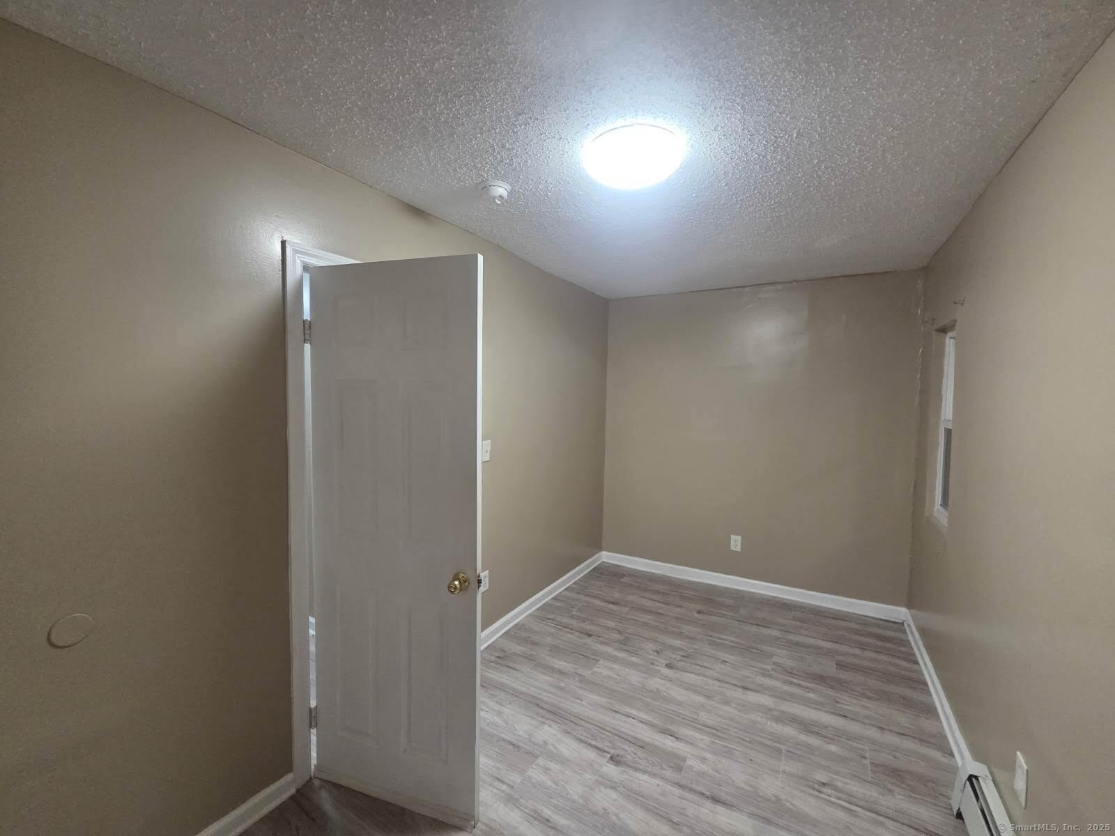 63 Seyms Street Hartford, CT 06120 - Photo 5 of 12 a view of an empty room