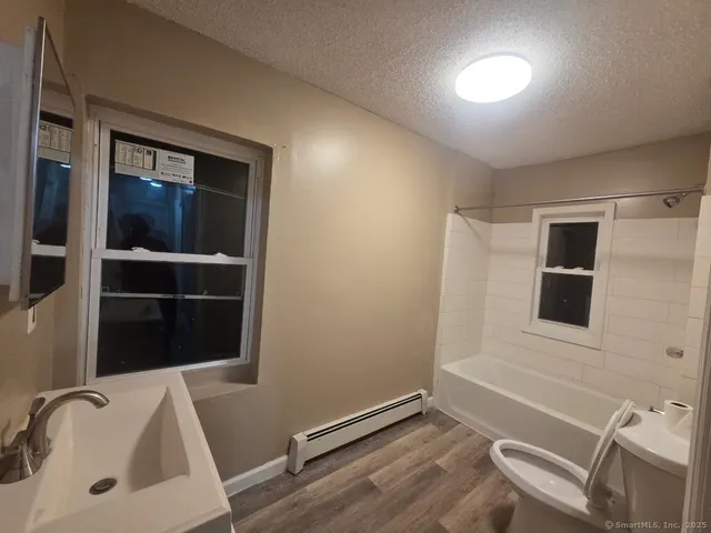 a bathroom with a sink and a tub